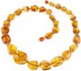 Beads made of multifaceted polished amber stones