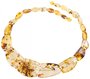 Beads made of figured translucent amber stones