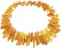 Beads made of polished light amber stones