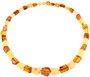 Beads with a combination of light and dark multifaceted polished amber stones