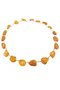 Beads-string made of honey-colored amber stones