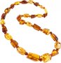 Amber beads with alternating figured stones and balls