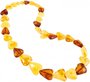 Beads made of amber stones in the shape of a heart