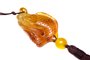 Pendant “Fish” on a wax rope with a tassel