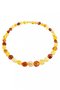 Beads made of multi-colored amber stones “Crumpled Cherry”