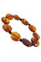 Bracelet made of amber stones in the shape of coins