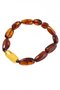 Bracelet made of amber stones “Grapes” with a contrasting insert