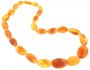 Polished amber beads