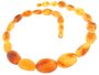 Polished amber beads