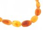 Polished amber beads