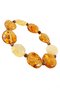 Bracelet made of amber stones and coins