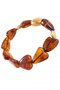 Heart bracelet with amber and decorative inserts