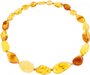 Beads made of polished multi-colored amber stones