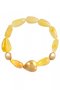 Bracelet with amber in the form of drops with decorative inserts