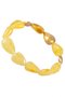 Bracelet with amber in the form of drops with decorative inserts