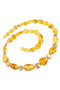 Beads made of amber and decorative elements