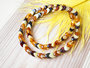 Beads with a combination of light, honey and dark amber “Amber leaves”