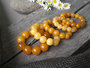 Massive bracelet made of amber balls