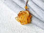 Pendant carved from amber “Rose”