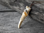 Amulet pendant made of deer horn and amber “Wolf Fang”