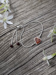 Silver bracelet with amber “Heart”