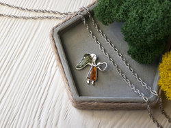 Silver pendant "Angel with a heart"