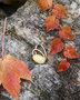 Silver pendant with amber, gilding and rhinestones "Steva"