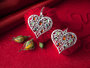 Earrings made of silver and amber “Hearts”