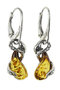 Earrings made of blackened silver with amber “Snakes”