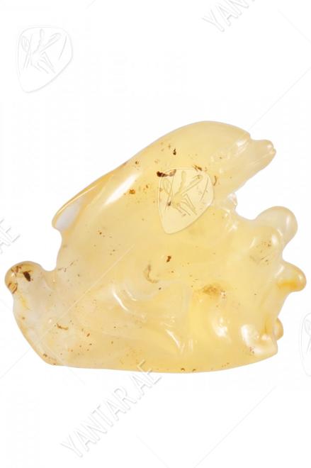 Amber souvenir “Dolphin and sea waves”