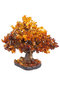 Bonsai tree with amber stones